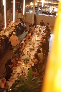 a group of people sitting at a table